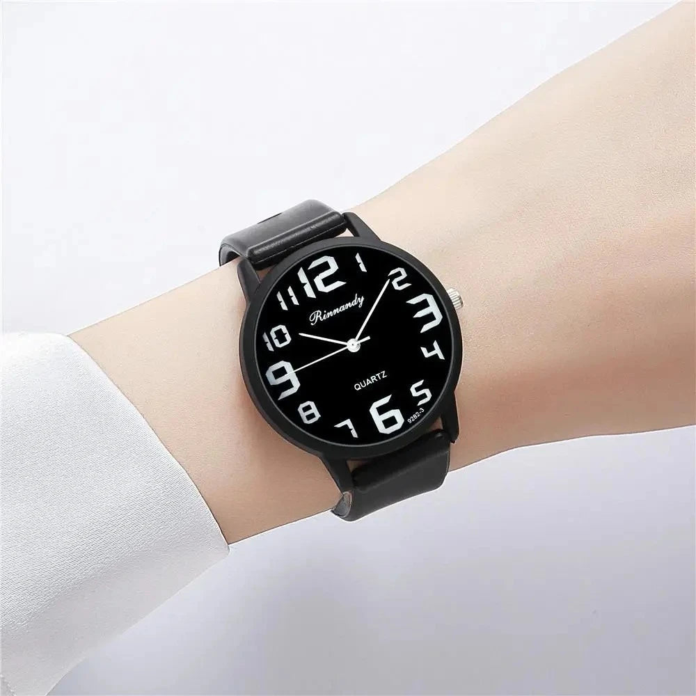 Reloj de cuarzo negro para mujer